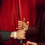 The Academy of Motion Picture Arts and Sciences has updated its rules: AI-generated performances and screenplays are ineligible for Academy Awards, effective from the March 2027 ceremony. Filmmakers may still use AI tools, but winning work must be human-performed and human-written — a clear formal standard as AI-generated film content goes mainstream.